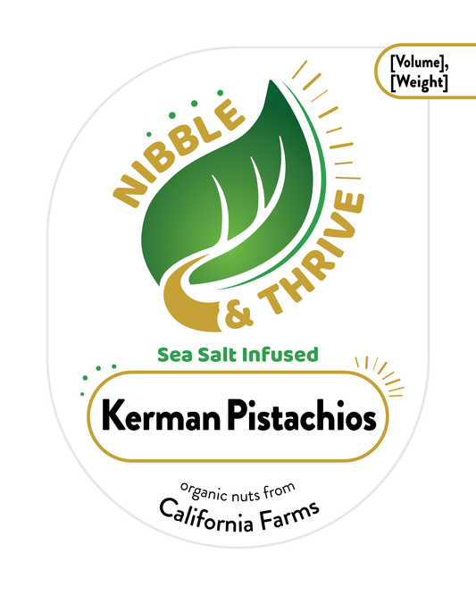 The label showcases Nibble & Thrive with a green leaf logo and reads Sea Salt Infused Kerman Pistachios, Organic, emphasizing California-grown pistachios rich in healthy fats and antioxidants. Theres a spot for volume and weight in the top right corner.