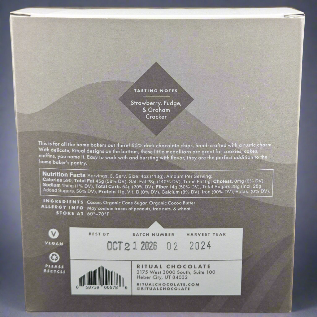 The Ritual Chocolate Chunks package highlights tasting notes of strawberry, fudge, and graham cracker. It features nutritional facts and organic cacao beans as ingredients. Best by October 21, 2026, the beige packaging with white text enhances this premium baking chocolate experience.